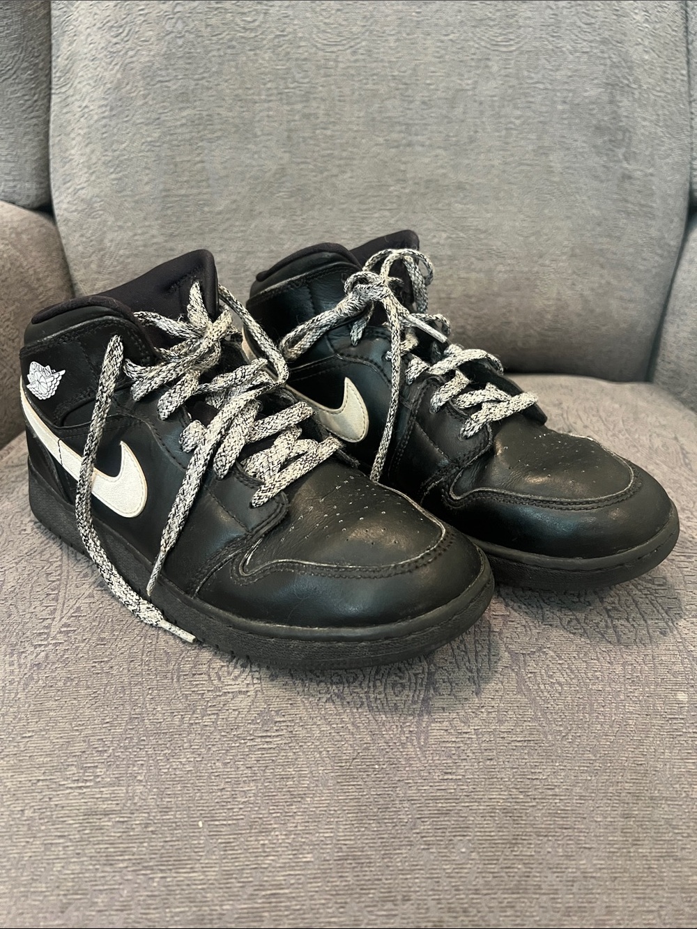 Nike Kids Black High-Top Sneakers with White Swoosh